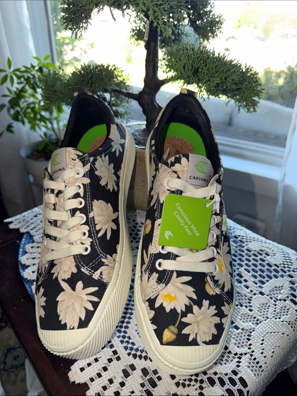 Cariuma Black Canvas Sneakers with Cream Floral Print and Yellow Accents